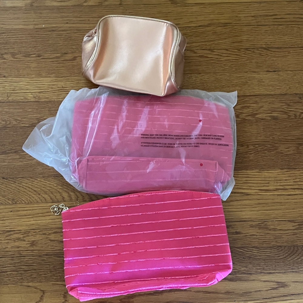 2 Estée Lauder and 1 Lancôme bag n